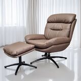 Havana lepotuoli rahi mukana, ruskea verhoilu ja keinuntamekanismi.